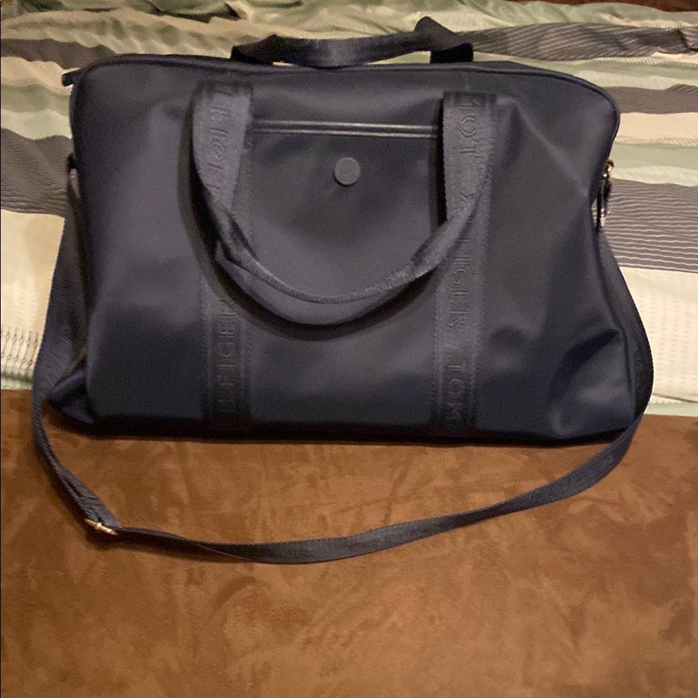 Tommy Hilfiger Navy Blue Duffel Bag with Adjustable Strap and Durable Fabric